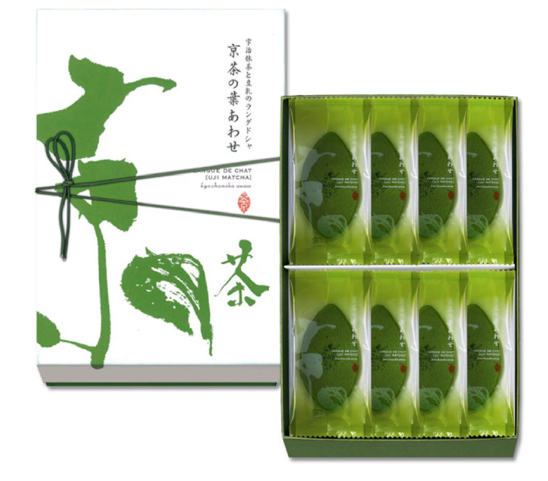 A boxed green tea product shown on a white background, with the outer box on the left and the inner package of individually wrapped tea packets on the right. The packaging features green leaf illustrations and Japanese text.